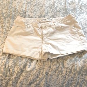 White stretch mid rise jean shorts